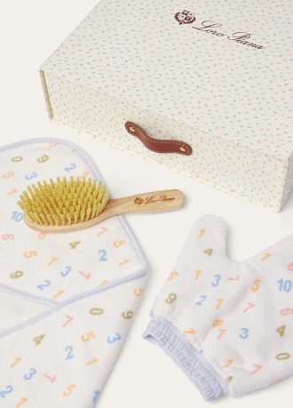 Conjunto de banho para bebê à beira-mar